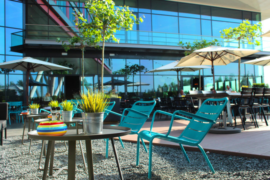 Blue chairs on the terrace of Van der Valk Hotel Veenendaal